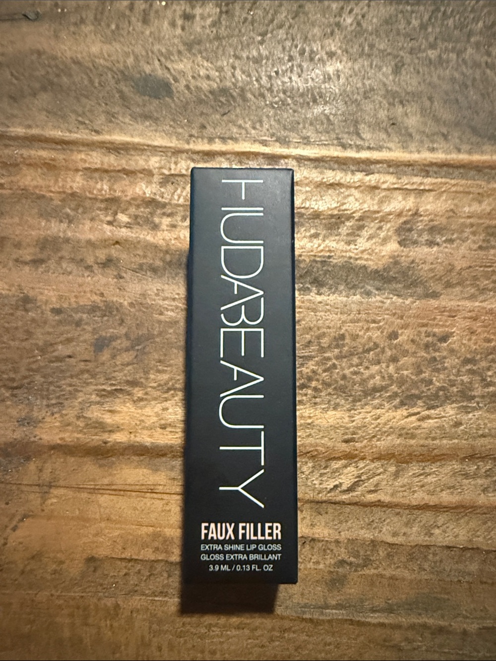 HUDA BEAUTY Faux Filler Extra Shine Lip Gloss - Black Packaging